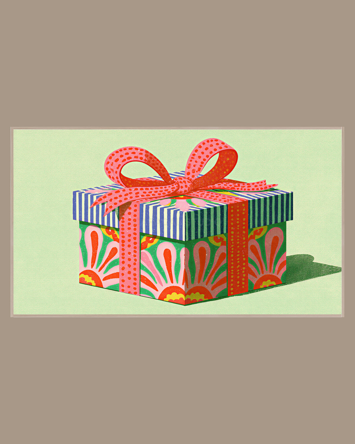 Christmas Frame TV Art of a gift box with folk patterns, a striped lid and a big pink bow on a mint green background, in a light wood frame on a warm taupe wall