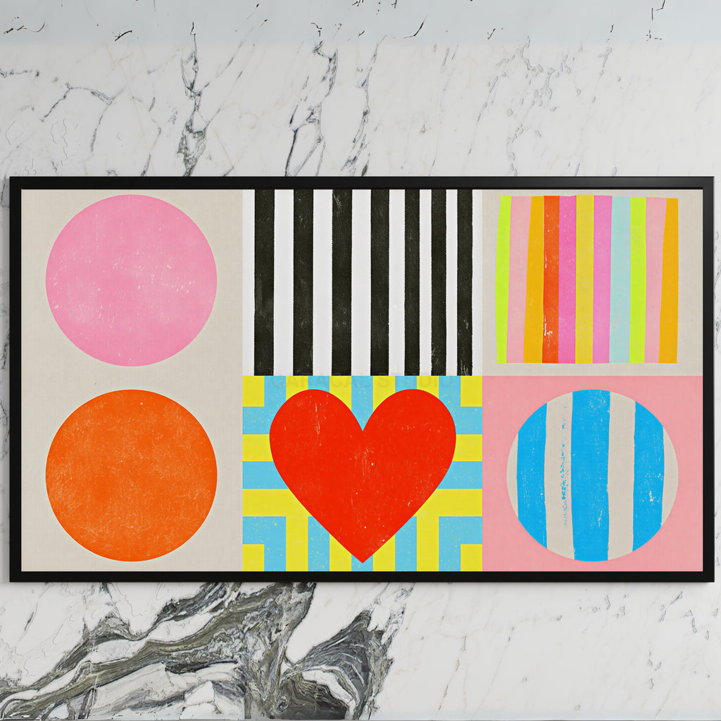 Colorful shapes and heart art on a black TV on a white marble wall