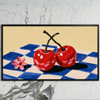 Cherry still life art on a black TV on a white marble wall