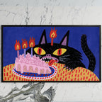 Birthday cat art on a black TV on a white marble wall