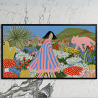 Flower garden and pink fox art on a black TV on a white marble wall