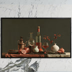 Wine and pomegranates still life art on a black TV on a white marble wall