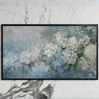 Hydrangea art on a black TV on a white marble wall
