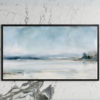Snowy landscape art on a black TV on a white marble wall