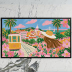 Lisbon tram art on a black TV on a white marble wall