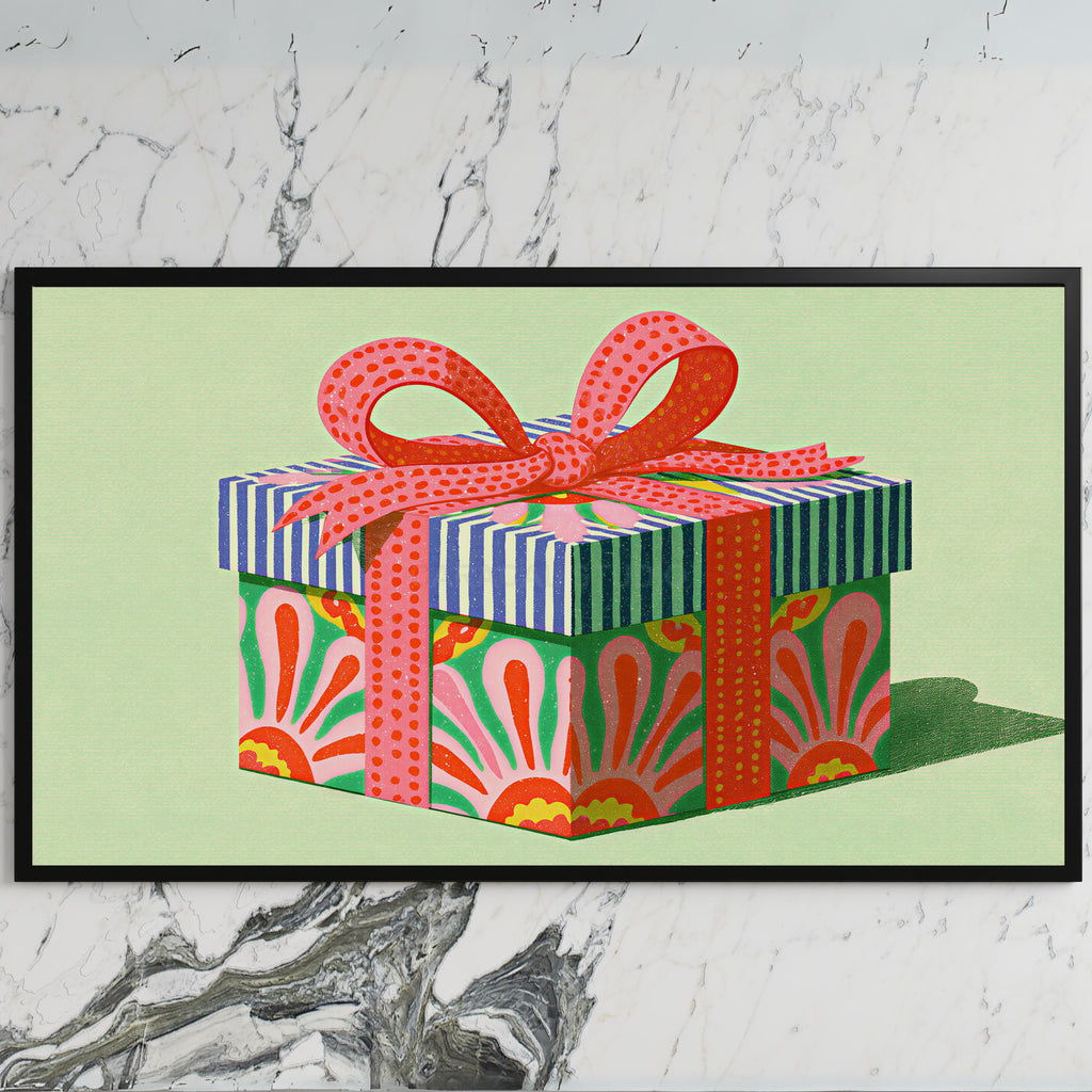 Gift box art on a black TV on a white marble wall