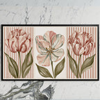 Tulip trio art on a black TV on a white marble wall