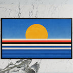 Retro sunset over the sea art on a black TV on a white marble wall