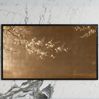 Japanese blossom art on a black TV on a white marble wall