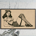 Vintage pin-up drawing art on a black TV on a white marble wall