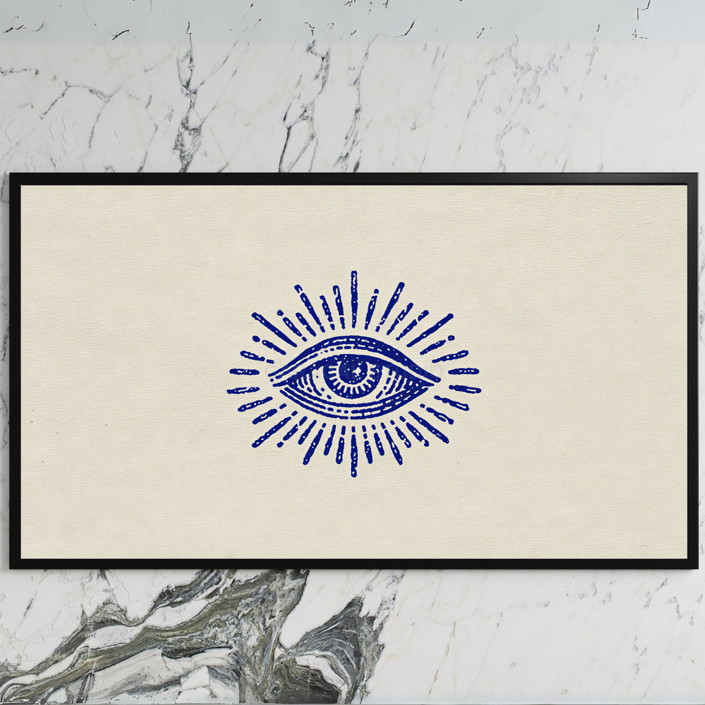 Mystic eye art on a black TV on a white marble wall