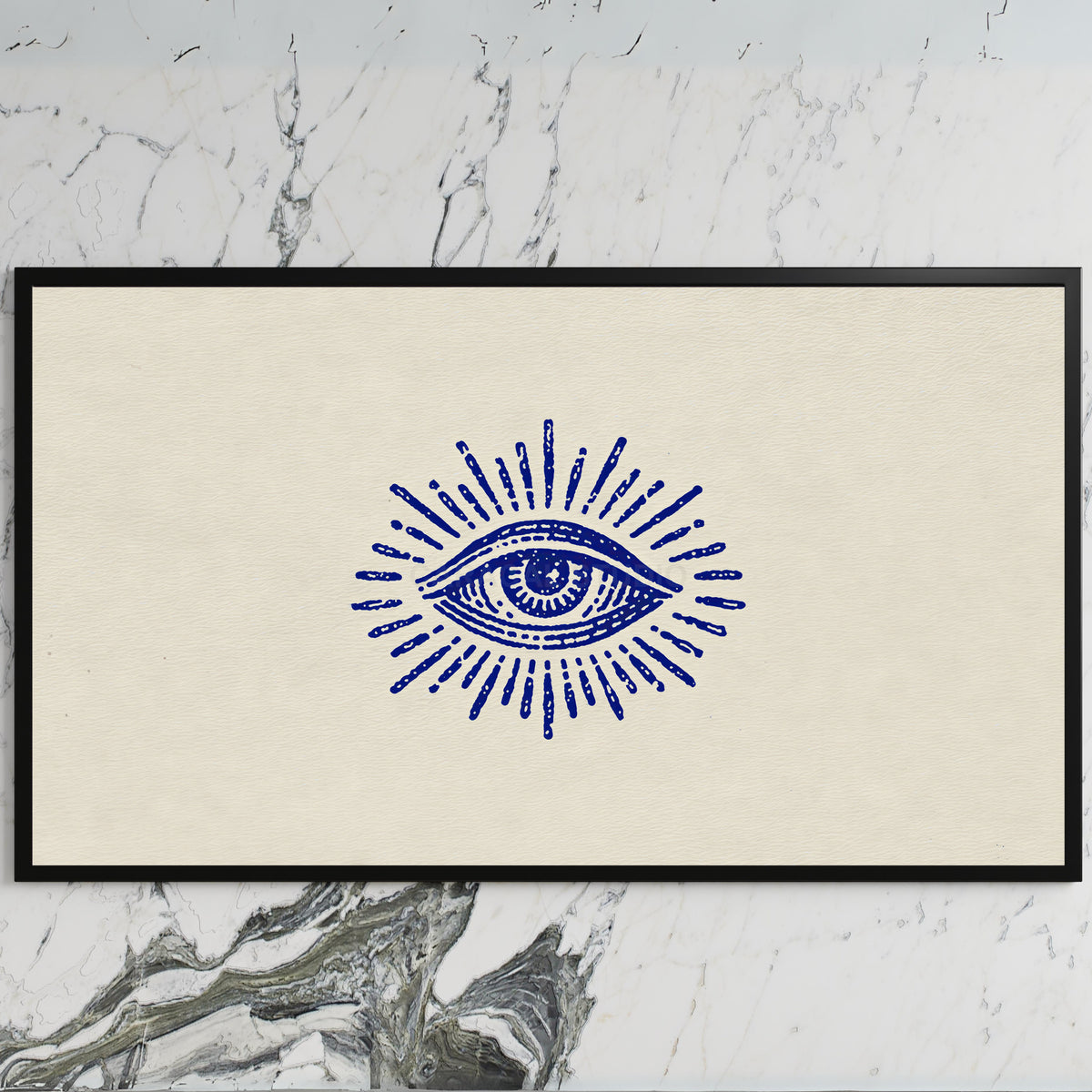 Mystic eye art on a black TV on a white marble wall