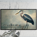 Blue heron art on a black TV on a white marble wall