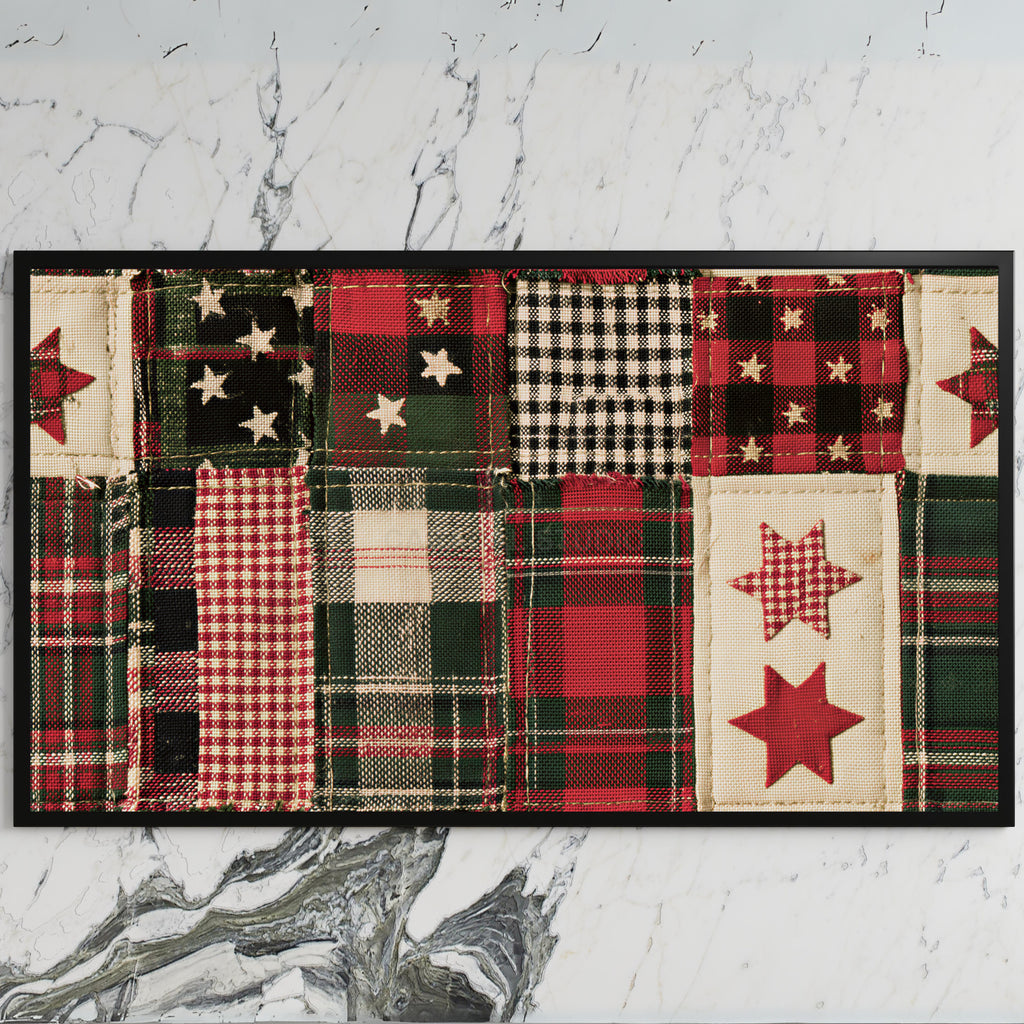 Plaid patchwork quilt art on a black TV on a white marble wall