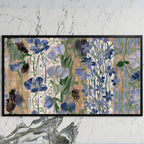Vintage blue florals art on a black TV on a white marble wall