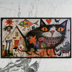 Grinning black cat art on a black TV on a white marble wall