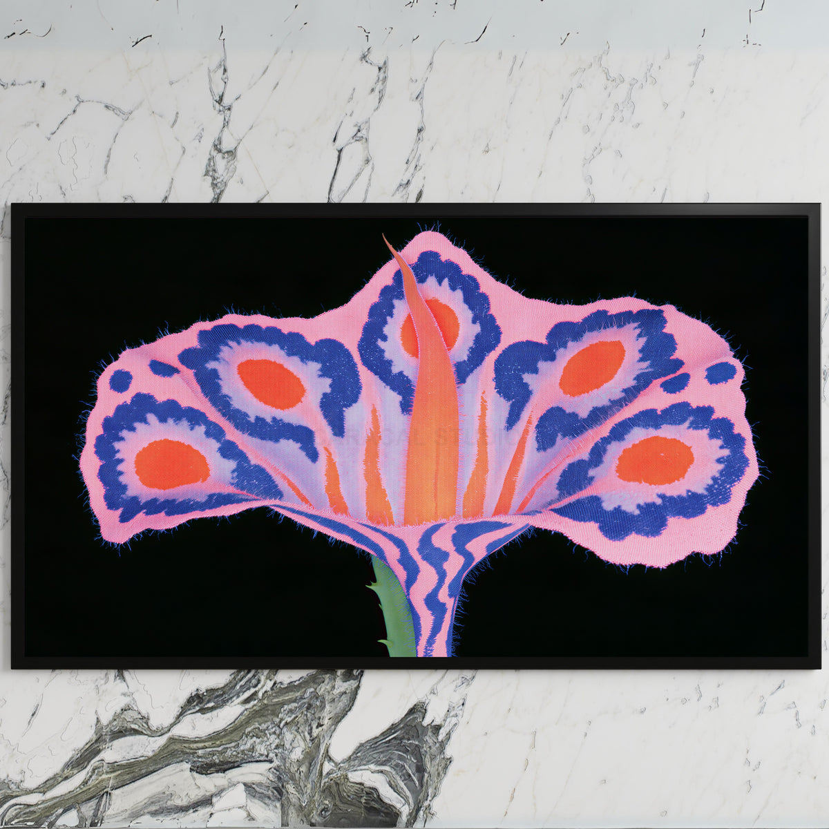 Surreal flower art on a black TV on a white marble wall