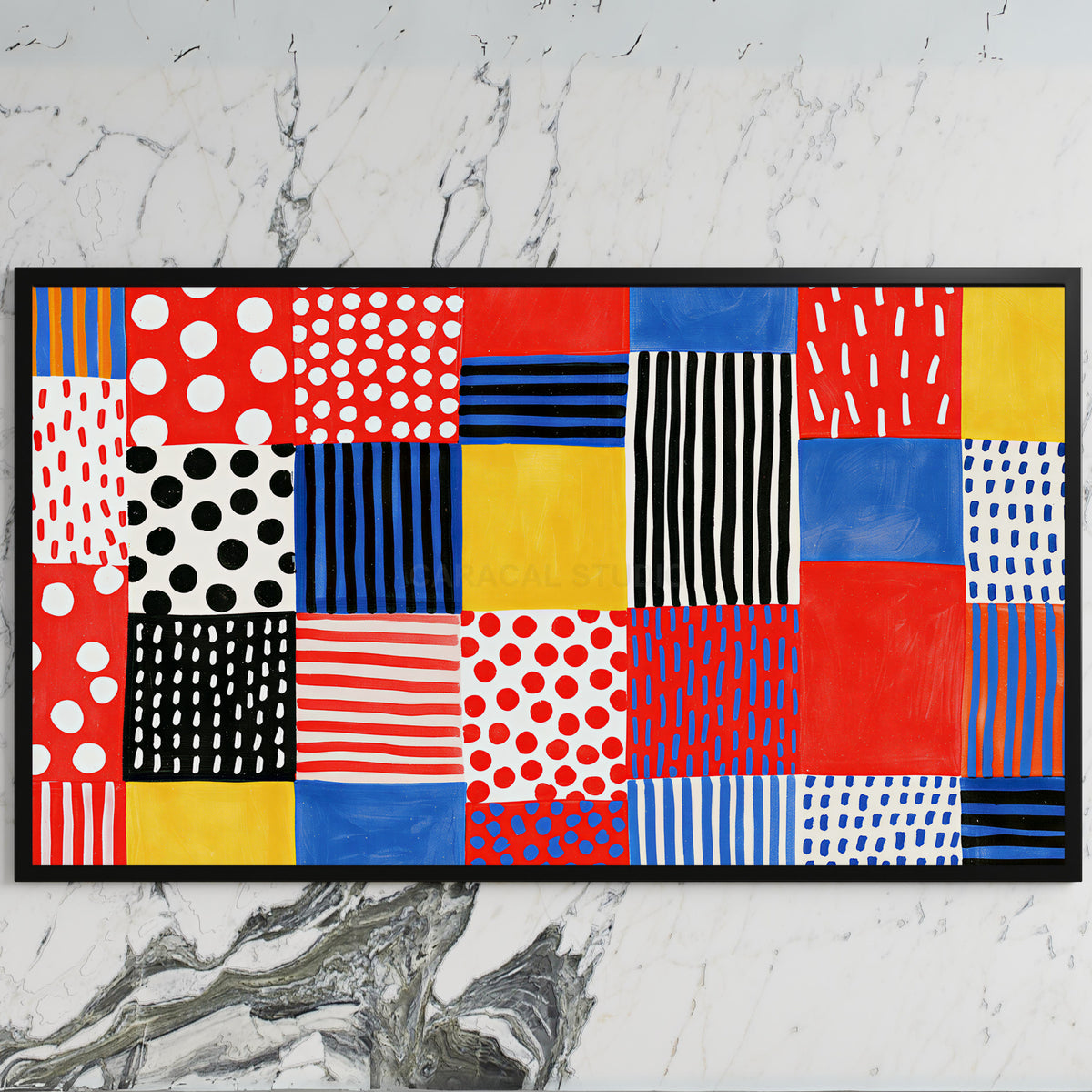 Polka dot patchwork art on a black TV on a white marble wall