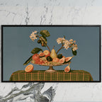 Fruit still life art on a black TV on a white marble wall