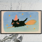 Black cat witch art on a black TV on a white marble wall