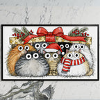 Cats under a gift box art on a black TV on a white marble wall