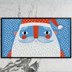 Santa face art on a black TV on a white marble wall