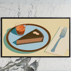 Chocolate tart and espresso art on a black TV on a white marble wall