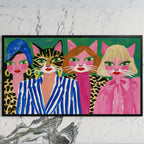 Cat ladies art on a black TV on a white marble wall