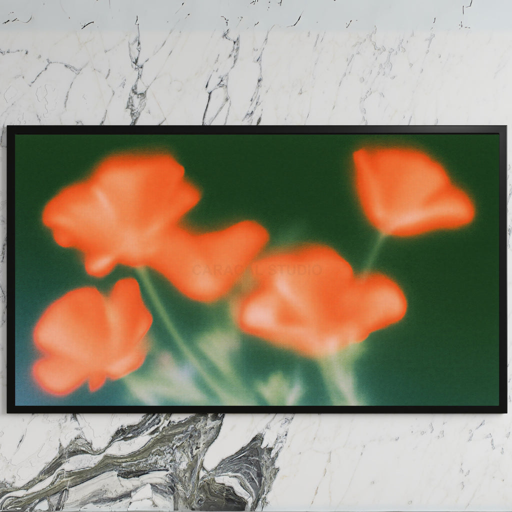 Blurred orange poppies art on a black TV on a white marble wall