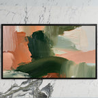 Green and peach abstract art on a black TV on a white marble wall