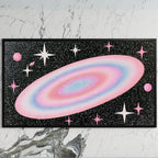Pastel galaxy art on a black TV on a white marble wall