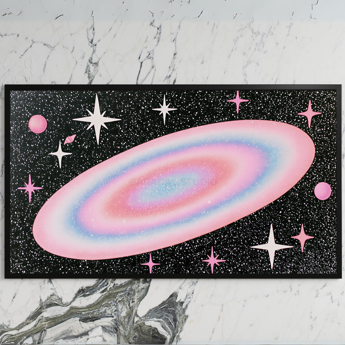 Pastel galaxy art on a black TV on a white marble wall