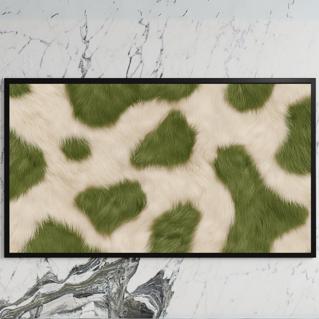 Olive cowhide art on a black TV on a white marble wall