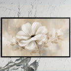 White flower art on a black TV on a white marble wall