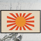 Retro sunburst art on a black TV on a white marble wall
