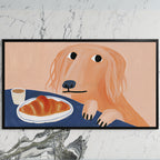 Dog with a croissant art on a black TV on a white marble wall