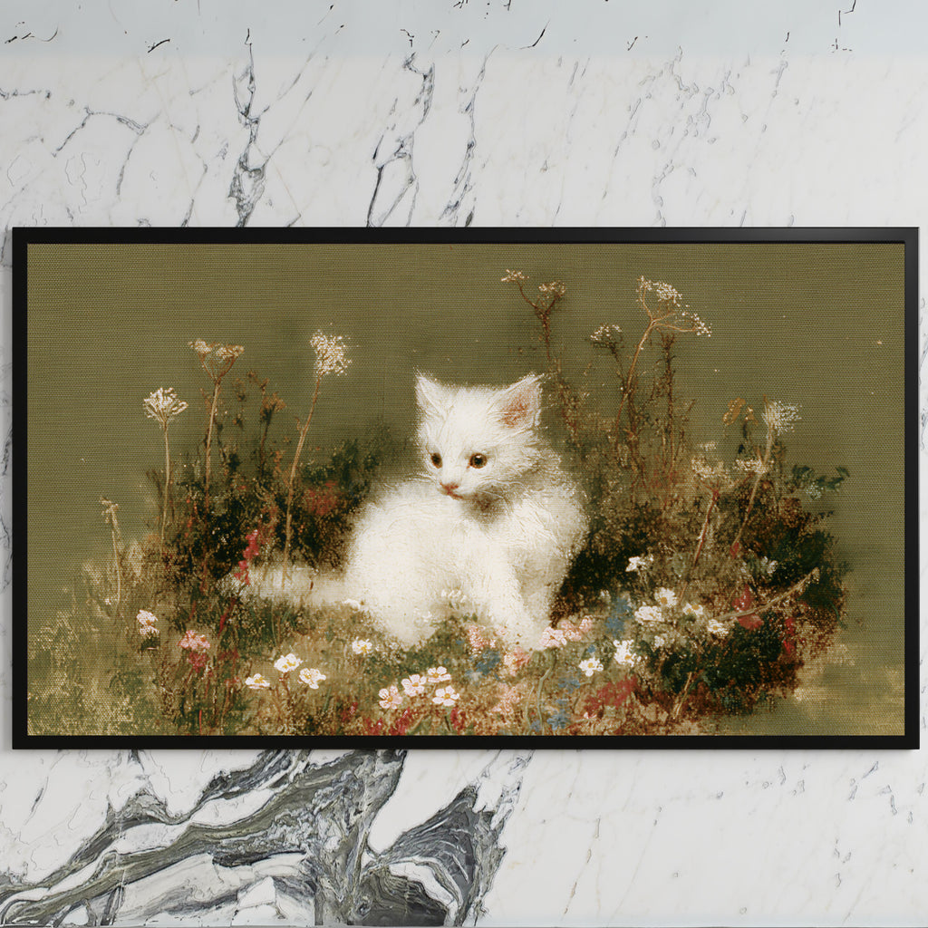 White kitten art on a black TV on a white marble wall