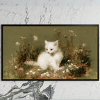White kitten art on a black TV on a white marble wall