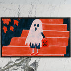 Ghost with a jack-o'-lantern bag art on a black TV on a white marble wall