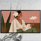 Woman with white flower art on a black TV on a white marble wall