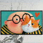 Man with his ginger cat art on a black TV on a white marble wall