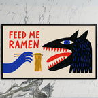 Feed Me Ramen art on a black TV on a white marble wall