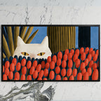 White cat and red tulips art on a black TV on a white marble wall