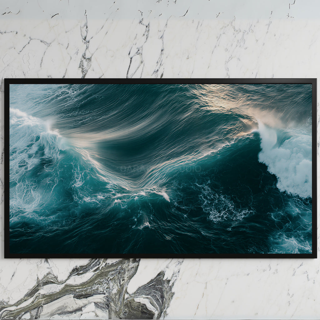 Aerial ocean waves art on a black TV on a white marble wall