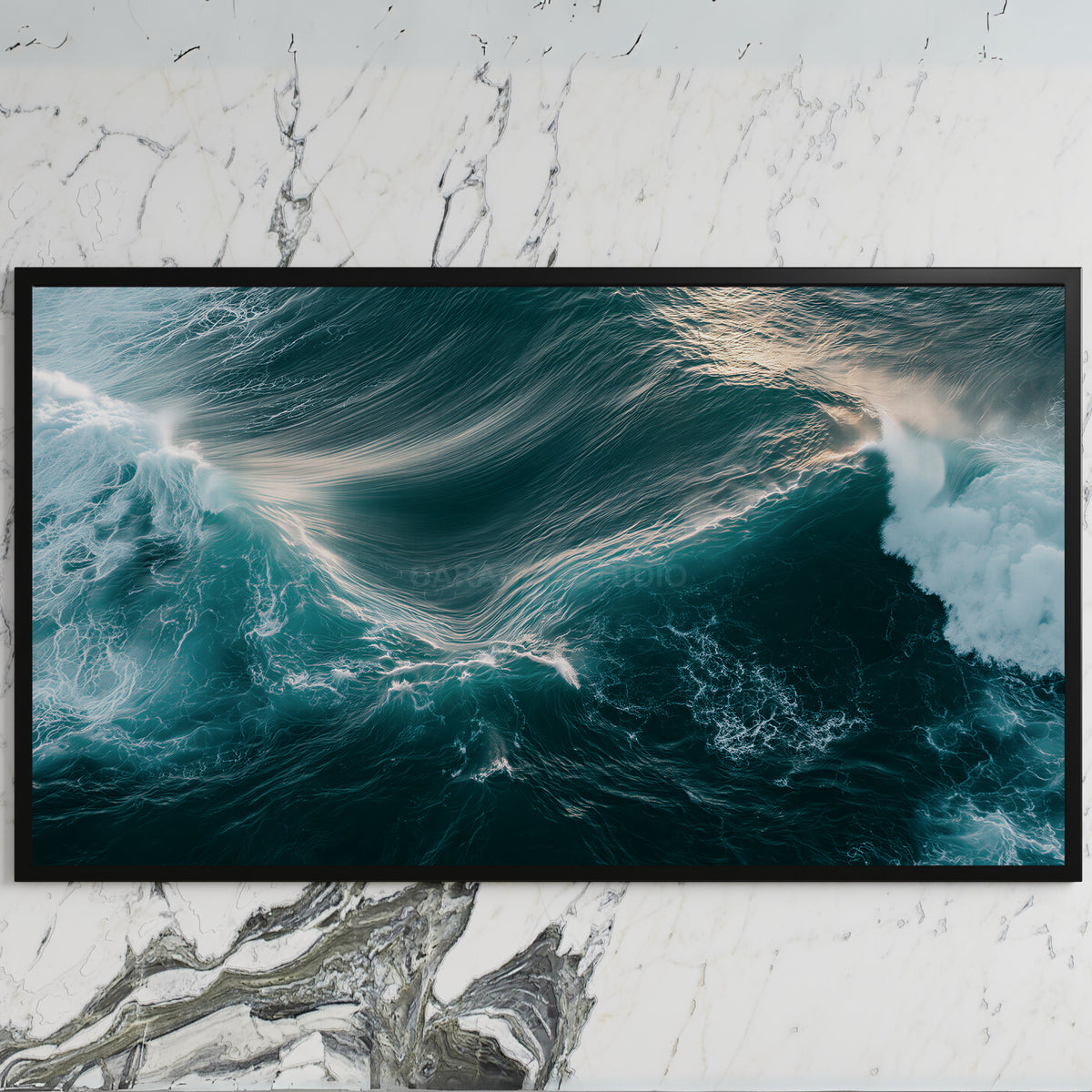 Aerial ocean waves art on a black TV on a white marble wall