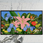 Tropical flower garden art on a black TV on a white marble wall
