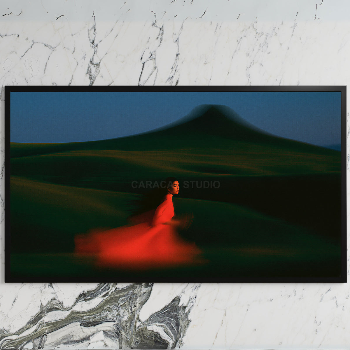 Woman running over green hills art on a black TV on a white marble wall