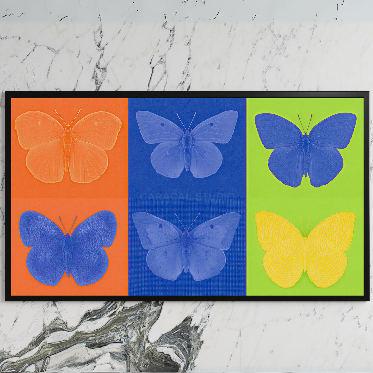 Pop art butterfly art on a black TV on a white marble wall