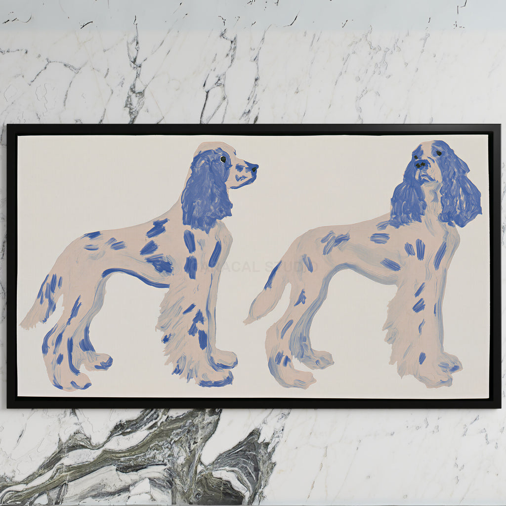 Spaniel figurines art on a black TV on a white marble wall