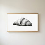 Croissant etching Frame TV art in an oak frame on a warm white wall